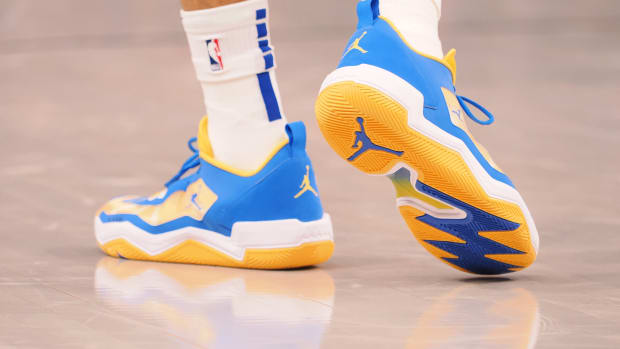 View of Russell Westbrook's blue and gold shoes.